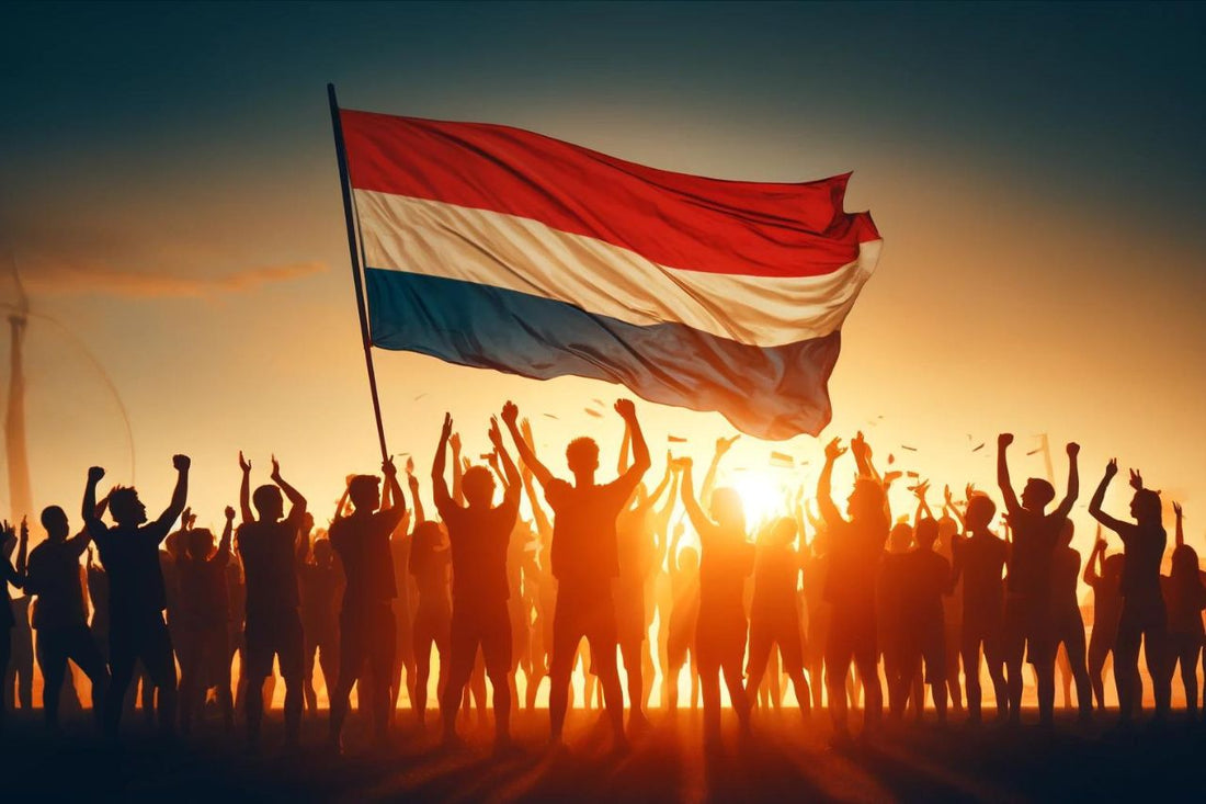 Grupa ludzi z flagą Holandii